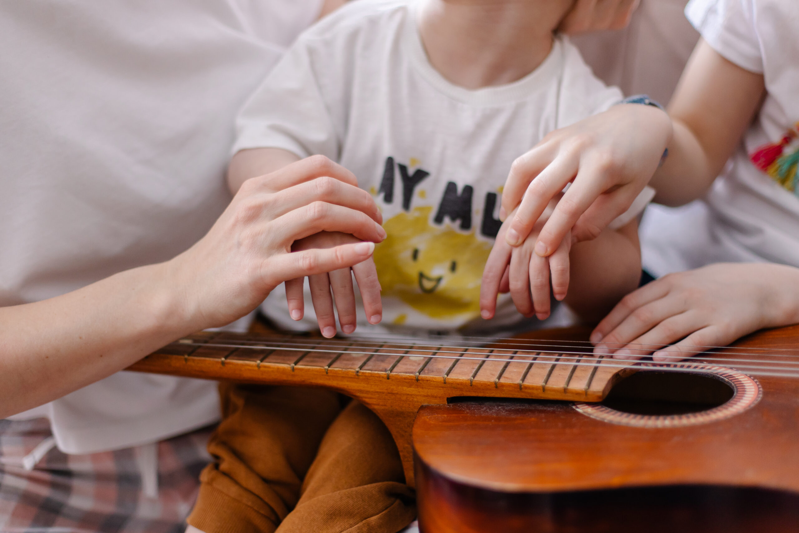 Hands,Of,A,Child,With,Cerebral,Palsy,Close-up.,Music,Rehabilitation.